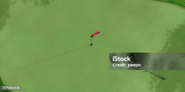 Overhead View Of Golf Hole With Flagstick Putter And Golfball Stock Photo - Download Image Now