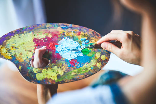 istock Woman painting 1271357247