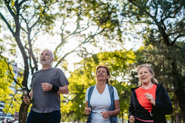 istock Active senior people running in park 1271367042