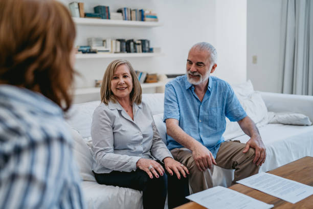 istock Real estate agent and her clients 1271367111