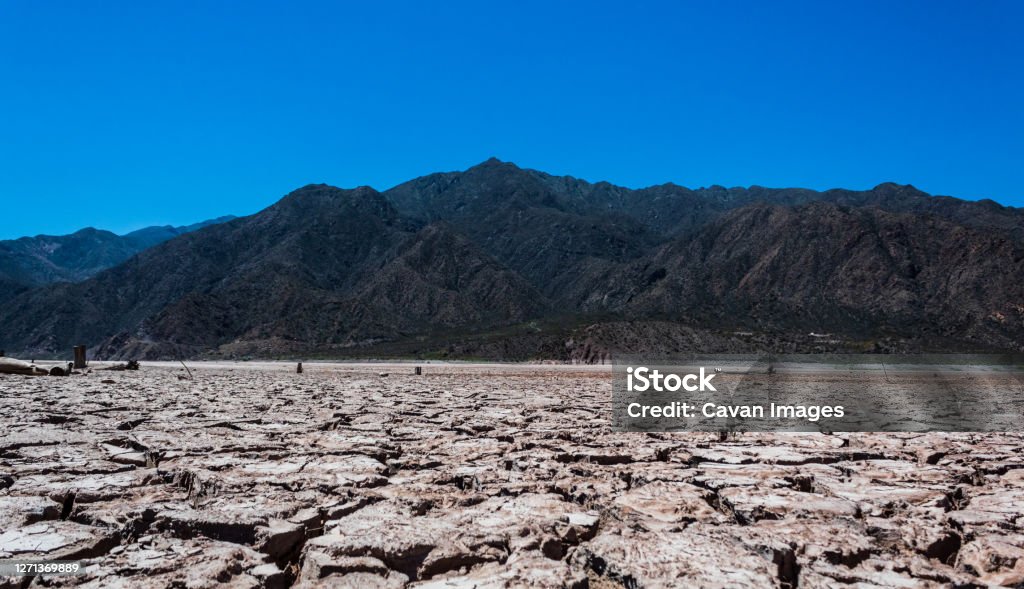Majestic mountain in front of dry ground. Majestic mountain in front of dry ground. in Maipú, Mendoza Province, Argentina Accidents and Disasters Stock Photo