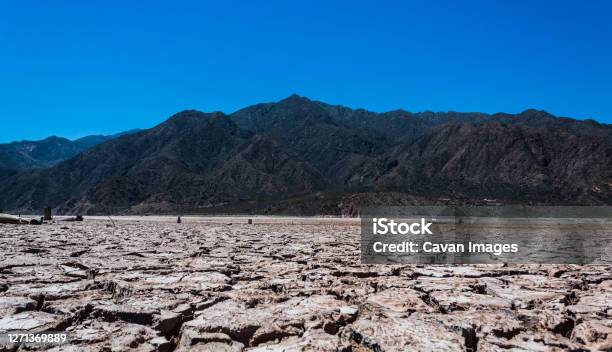 Majestic Mountain In Front Of Dry Ground Stock Photo - Download Image Now - Accidents and Disasters, Argentina, Arid Climate