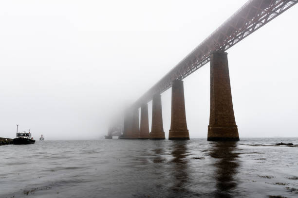 fourth bridge on foggy morning in Queensferry, Scotland, United Kingdom