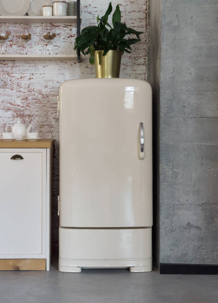 istock Vertical shot of vintage fridge in kitchen 1271377725