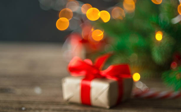 istock Blurred christmas background. Christmas gift box. Flat lay with copy space. wooden background. Winter holidays, New Year.Flat lay, top view, copy space. 1271378752