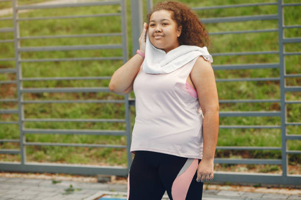 istock Over the size of a woman doing stretching exercises 1271379646