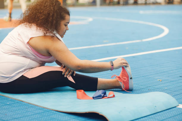istock Over the size of a woman doing stretching exercises 1271379681