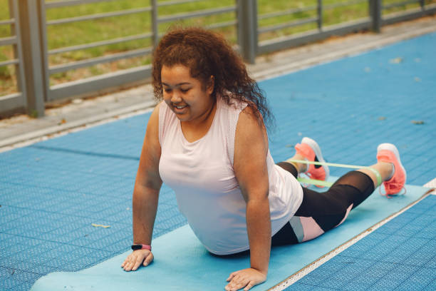 istock Over the size of a woman doing stretching exercises 1271379708