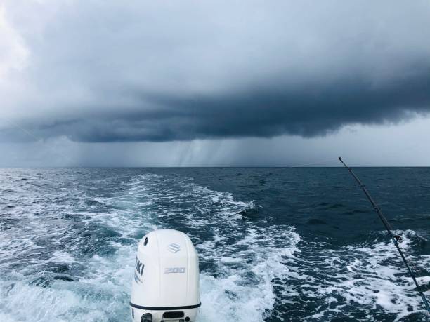 Offshore fishing running from a storm
