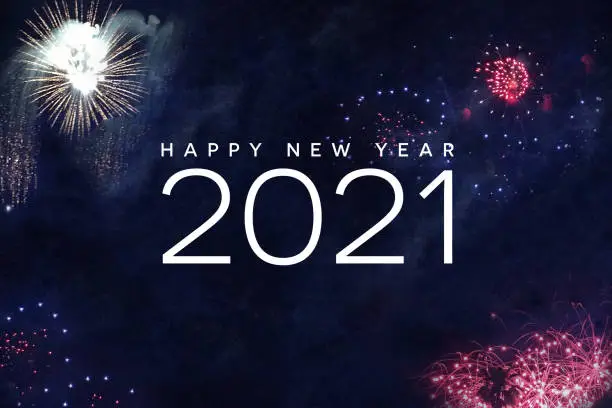 Happy New Year 2021 Text Holiday Celebration Graphic with Fireworks Background in Night Sky