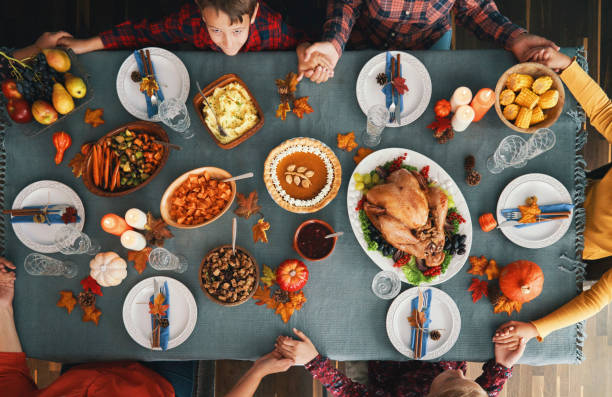 istock Family Having Traditional Holiday Stuffed Turkey Dinner 1271383076