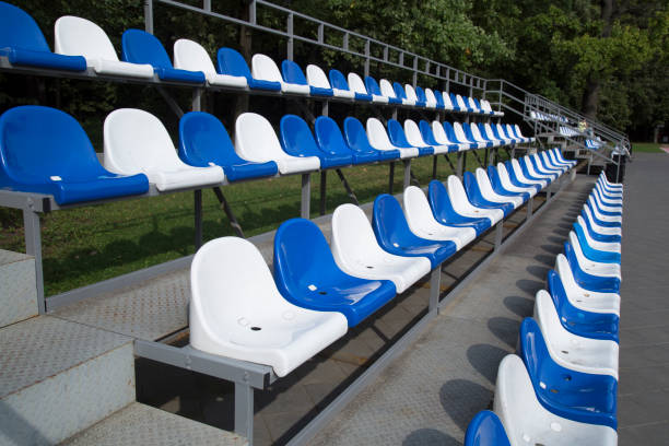 istock Plastic seats at the stadium. Construction of the stadium. 1271385388