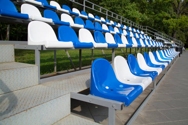 istock Plastic seats at the stadium. Construction of the stadium. 1271385404