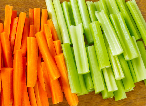 istock carrot and celery sticks on cutting board 1271387046