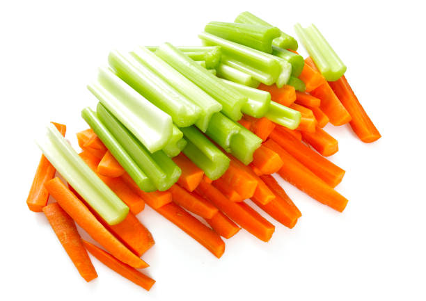 istock carrot and celery sticks isolated on white 1271387434