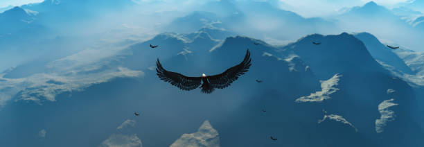istock Eagle flying in the clouds at dawn 1271391993