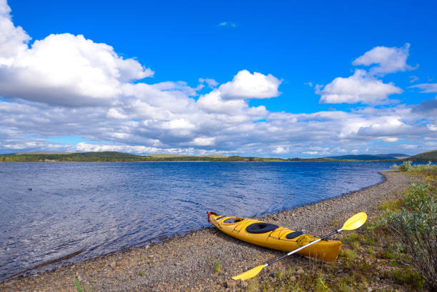 istock yellow kayak on the lake blue sky 1271396786