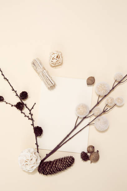 istock Autumn background with fall decor, blank stationary template, invitation mock up, empty paper card with copy space for text from top on beige background. Top view. Flat lay. Fall winter seasons 1271399887