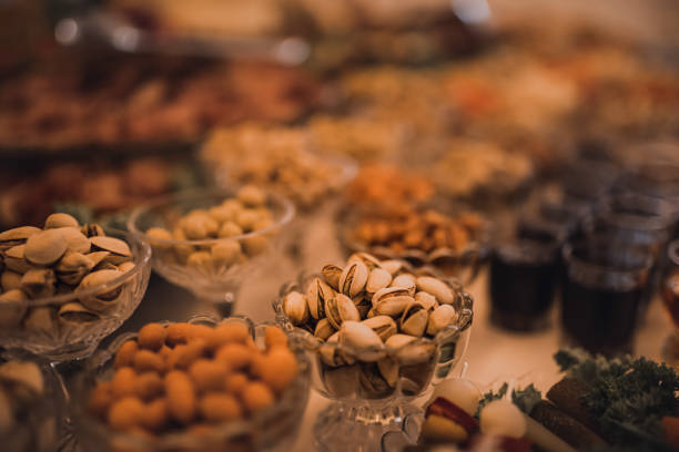 Table with food for the holiday. Cuisine. Culinary Buffet. Dinner Catering. Dining Food. Celebration Party. Concept wedding birthday. Sweet pastries desserts