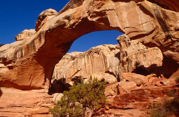 istock Natural Rock Arch in the Sky 1271408642