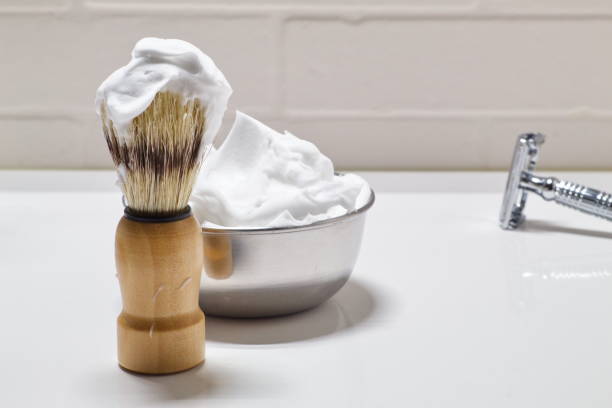 istock Shaving set with blade, brush and bowl with foam 1271409636