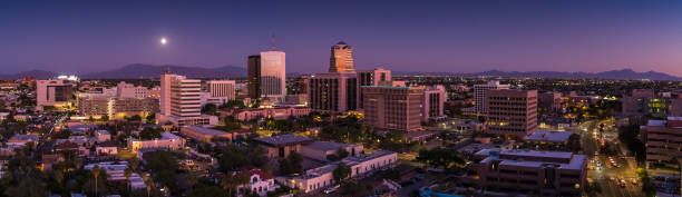 istock Moon Rising Over the Mountains Beyond Downtown Tucson 1271413135
