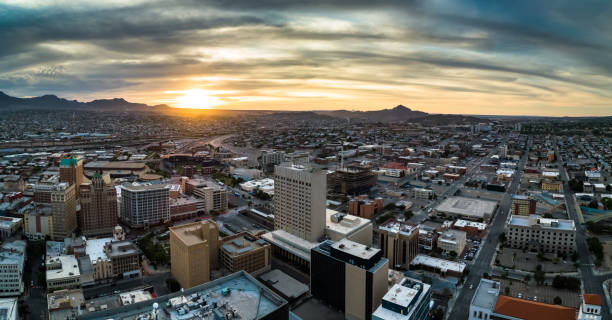 istock Sun Setting Behind Juarez Mountains in El Paso and Ciudad Juarez 1271413252