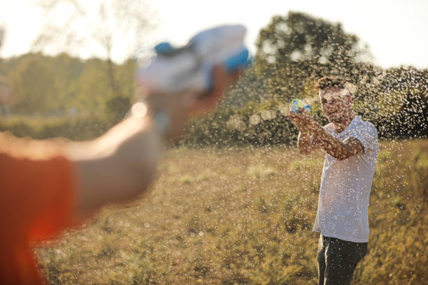 istock Water Fight and Good Friends Environment 1271413483