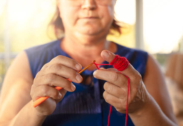 Close up of knitting woman's hands