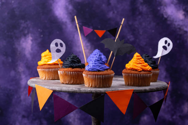 istock Halloween cupcakes with color cream 1271417356