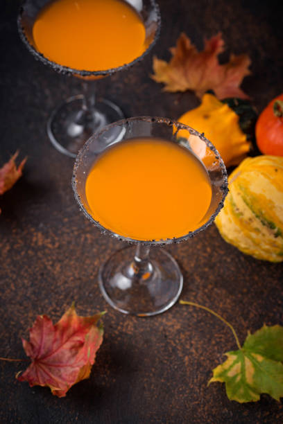 istock Halloweens drink pumpkin martini cocktail 1271417497