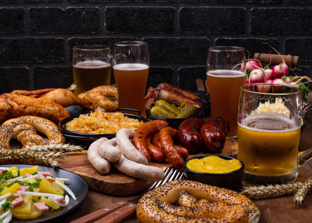 istock Beer Fest dishes with beer, pretzel and sausage 1271417543