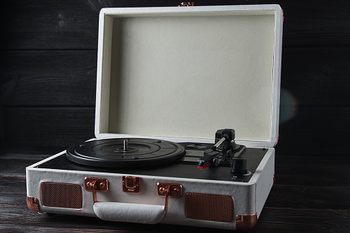 white gramophone in a suitcase, vinyl player, subject photography in Kyiv, Kyiv City, Ukraine