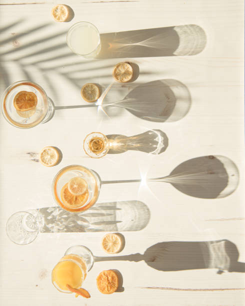 flat lay of glasses and cups in harsh light - wine abstract drink alcohol imagens e fotografias de stock