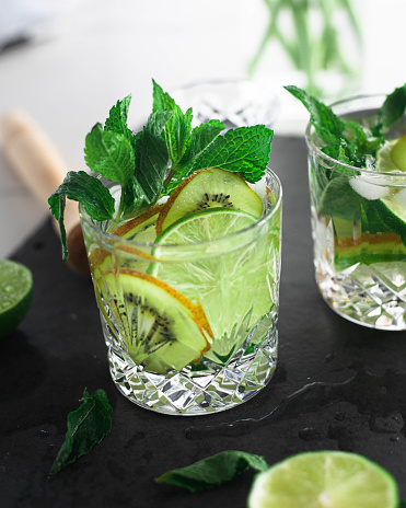 Mojito drink with kiwi and lime