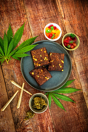 This is a stock photograph involving cannabis in brownies, marijuana and its implications in America has just slowly been legalized and used for medicinal and medical purposes and what that means to our economy and culture.