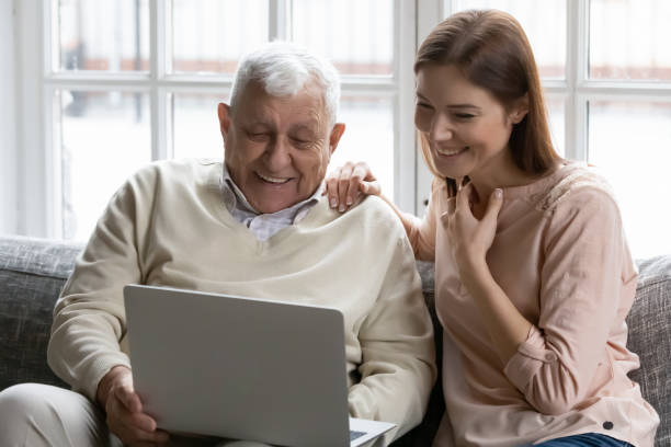 istock Happy different generations family watching film on computer. 1271431626