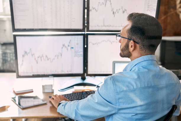 istock Businessman analyzing global bitcoin price on network diagram 1271432108