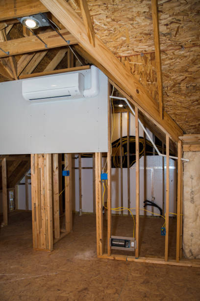 istock Mini-split ductless air conditioning unit installed in unfinished room 1271444163
