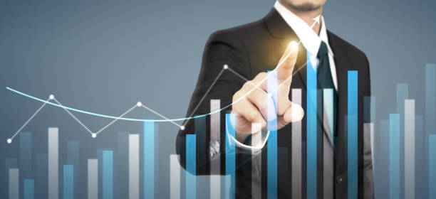 istock Businessman plan graph growth increase of chart positive indicators in his business 1271447882