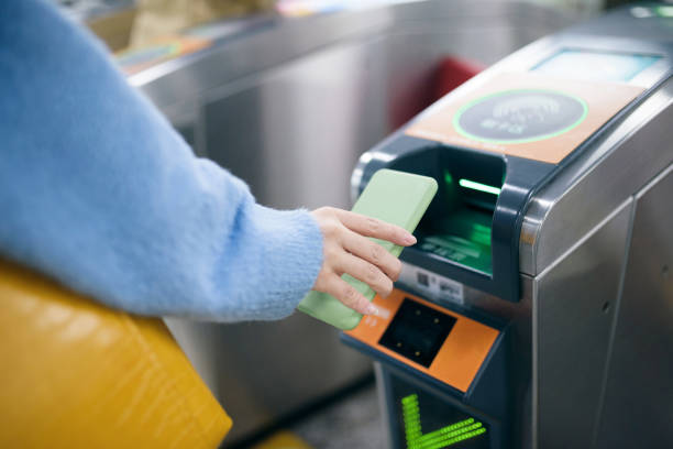 istock Using smart phone to pay at subway station. 1271453518