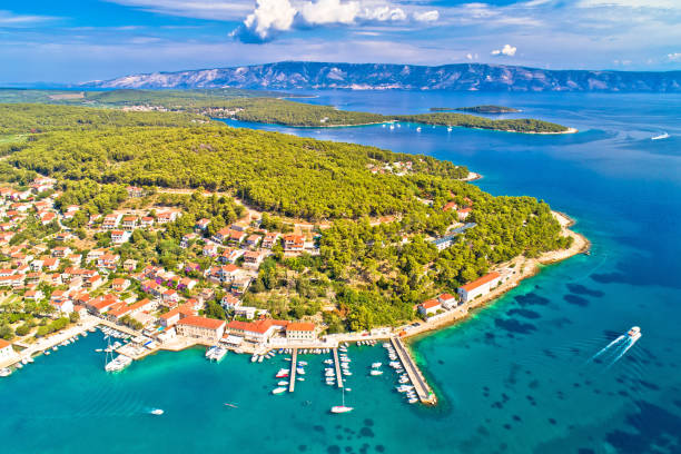 Town of Jelsa bay and waterfront aerial view Town of Jelsa bay and waterfront aerial view, Hvar island, Dalmatia archipelago of Croatia jelsa stock pictures, royalty-free photos & images