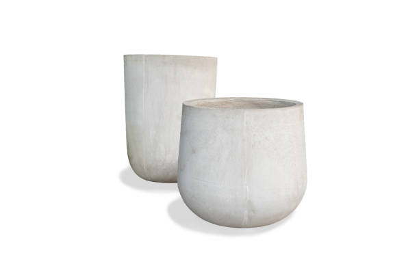 istock 2 Bare concrete round base plant pot(Tall and short) on white background. 1271458876