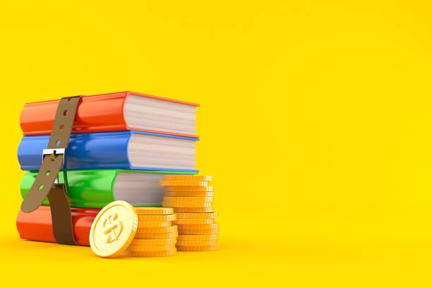 istock Books with stacks of coins 1271460877