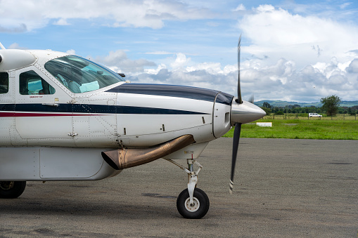 Arusha, Tanzania - december 28, 2019 : Small propeller airplane before takeoff at Arusha airport, Tanzania, east Africa