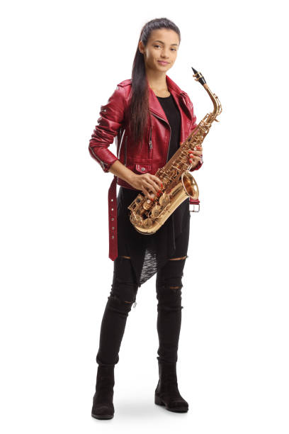 ritratto a figura intera di un sassofonista femminile in pelle rossa con in mano un sassofono - art coat full length foto e immagini stock