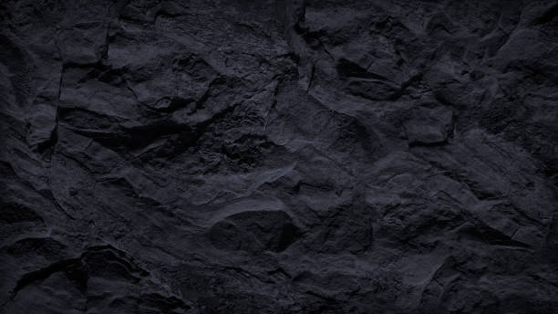 istock Abstract black background. Dark stone background. Black rock texture.Stone wall. 1271466339