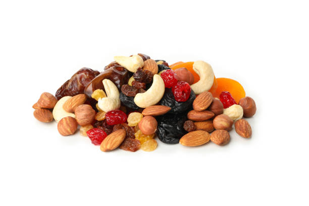 istock Nuts and dried fruits isolated on white background 1271469389