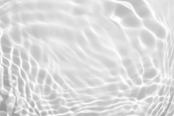 istock desaturated transparent clear calm water surface texture 1271471490
