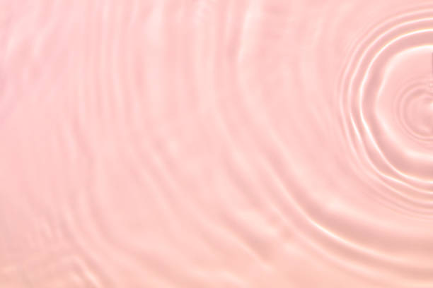 istock pink transparent clear water surface texture summer background 1271471598